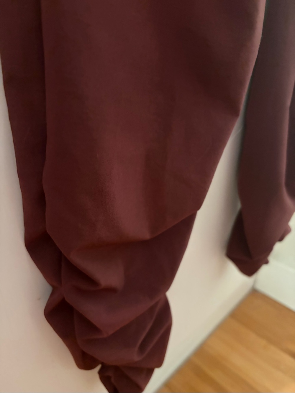 Prana reddish-brown jumpsuit with ruching on the legs